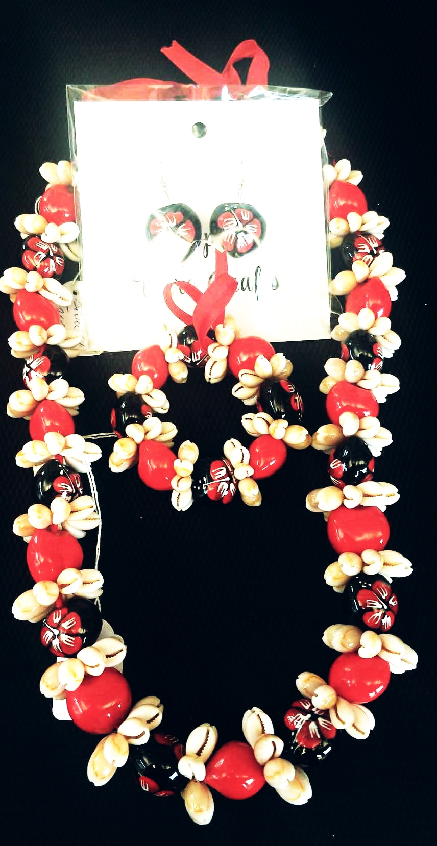 Kuikui/Cowrie Rosette set includes earrings and Bracelet